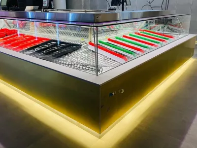 Dine-in seating alongside the butchery display at NAK Meats