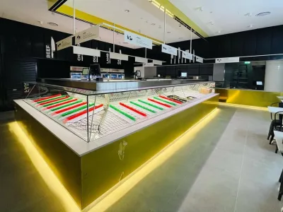 Preparation area and point of sale positions behind the display cabinet