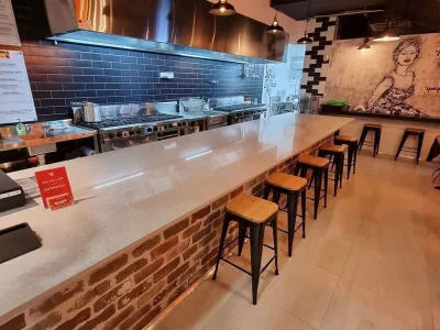 Open cooking line and stone servery counter at Pasta La Vista in Kogarah