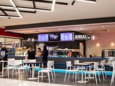 Seating area in front of The Messy Tomato