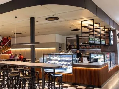 Open servery and stool seating at The Messy Tomato